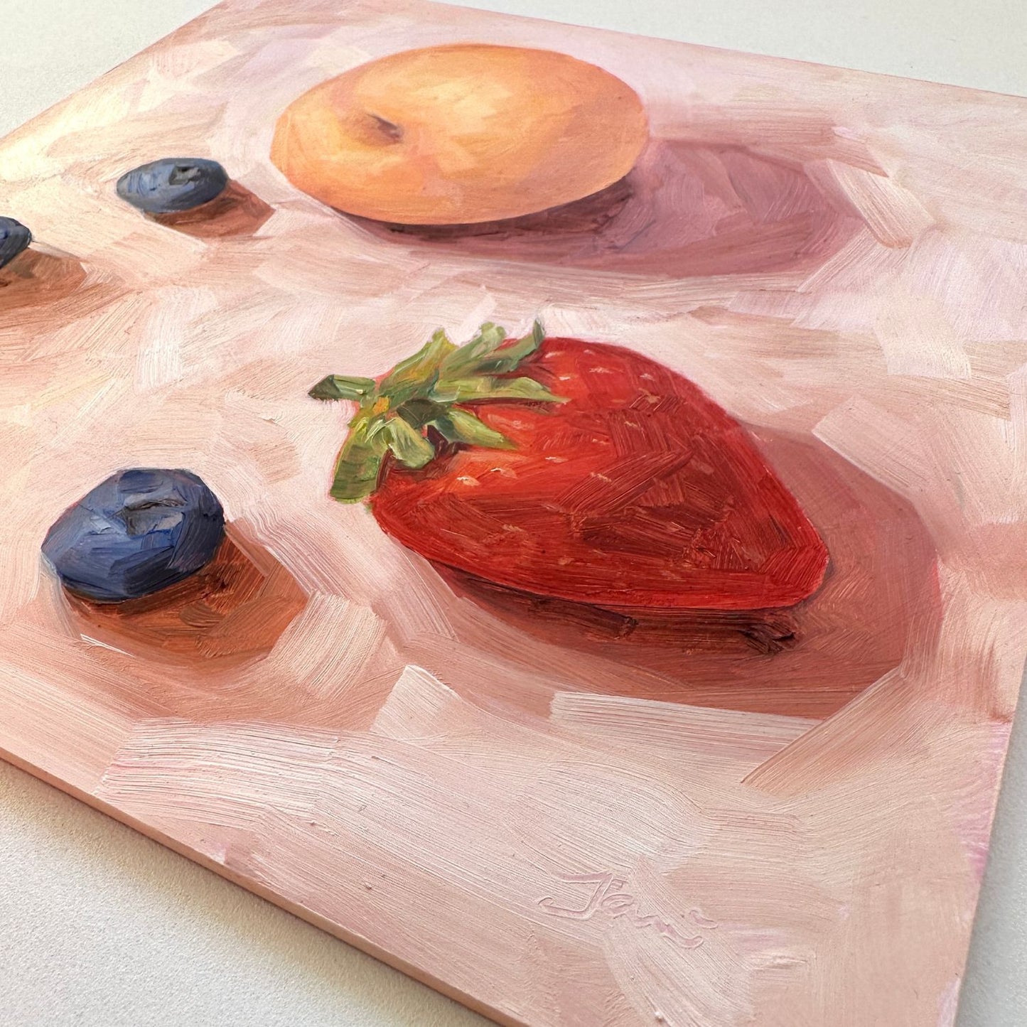 contemporary and modern original oil painting of fruits such as apricot, strawberry and blueberries on a textured creamy colored background