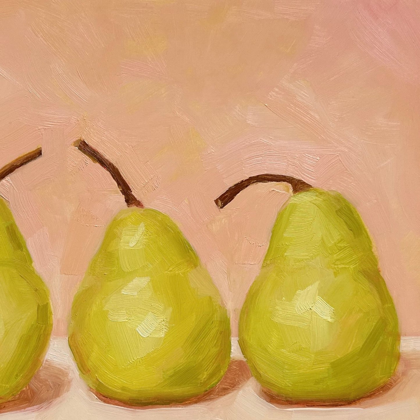 modern and contemporary oil painting of three soft green pears on a soft peach and cream background