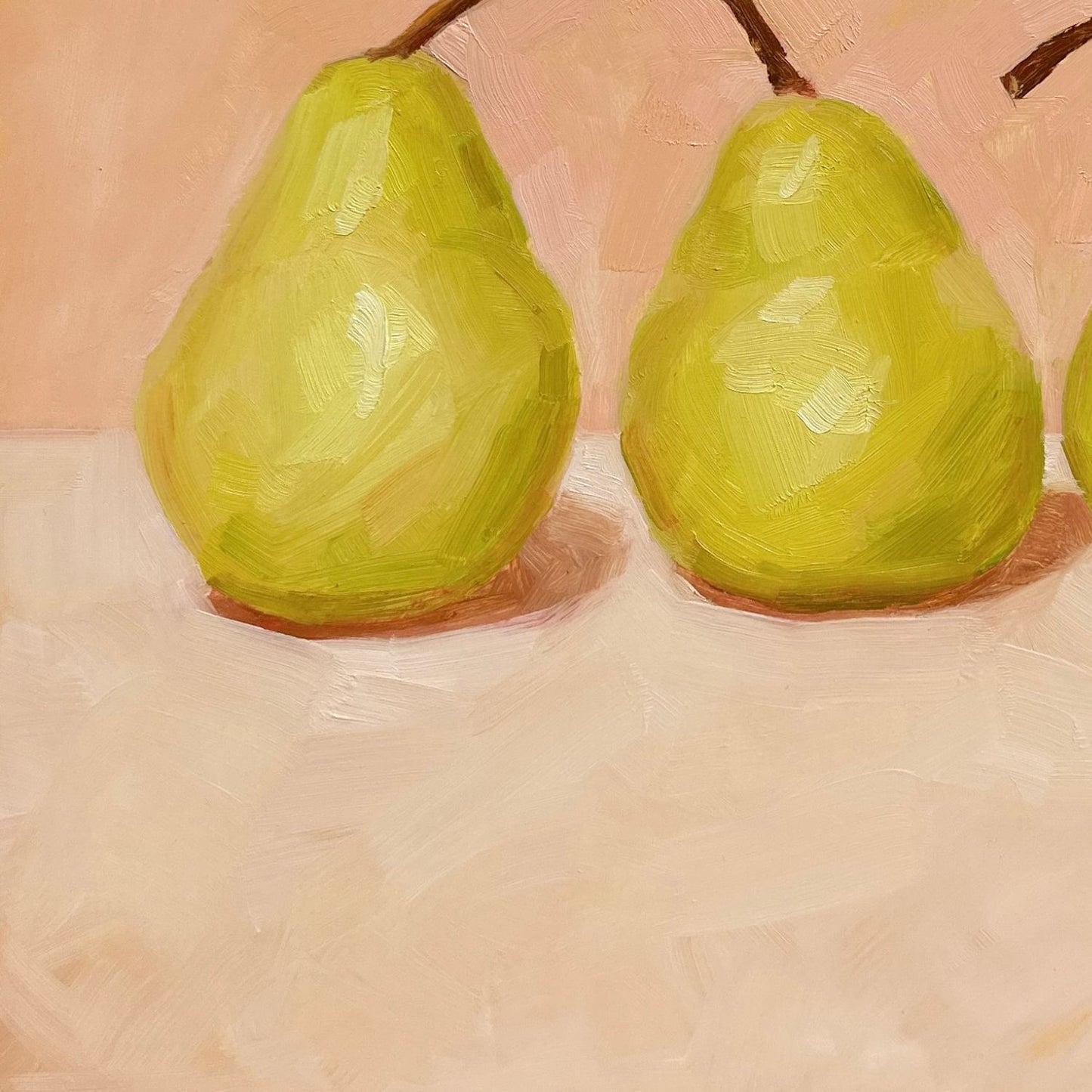 modern and contemporary oil painting of three soft green pears on a soft peach and cream background