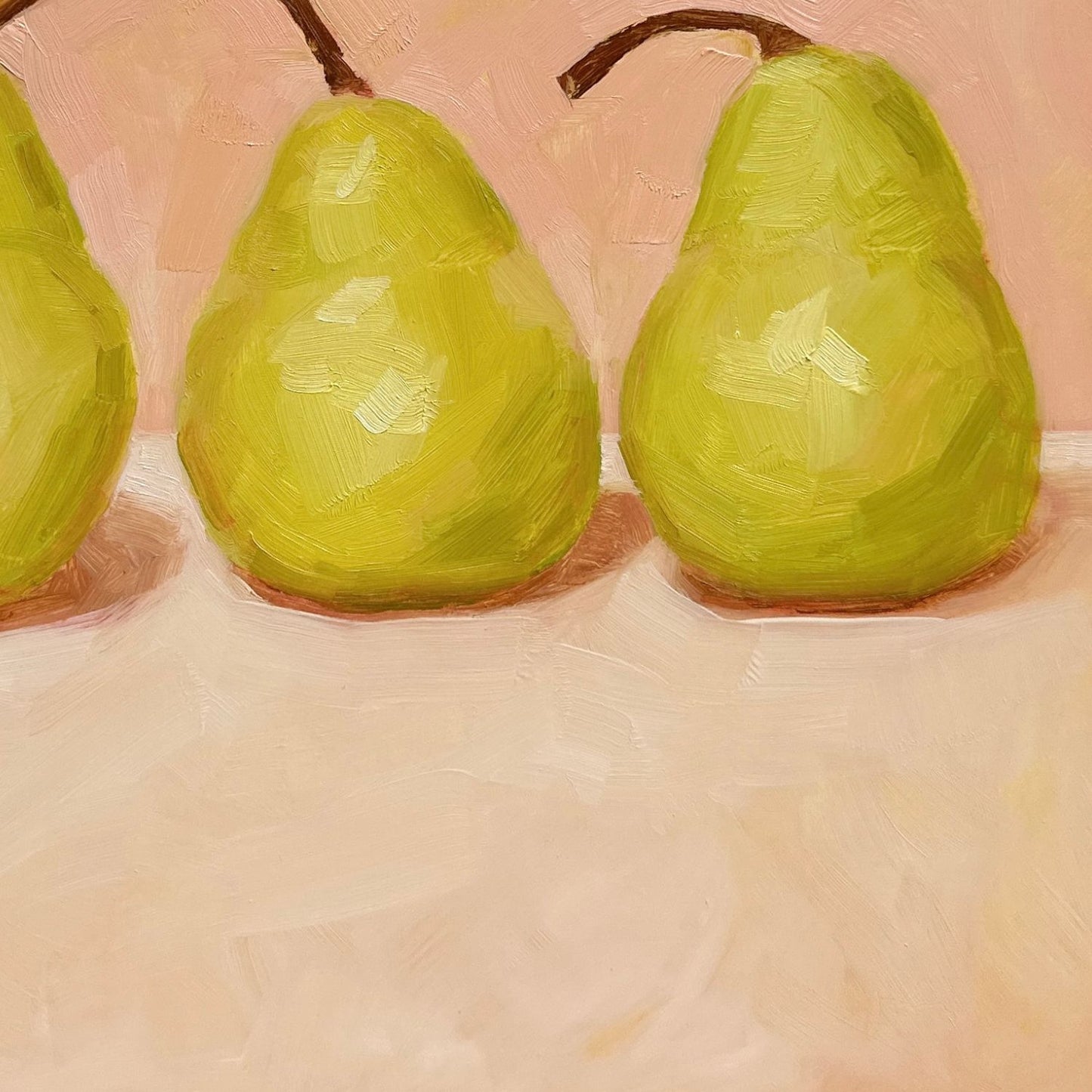 modern and contemporary oil painting of three soft green pears on a soft peach and cream background