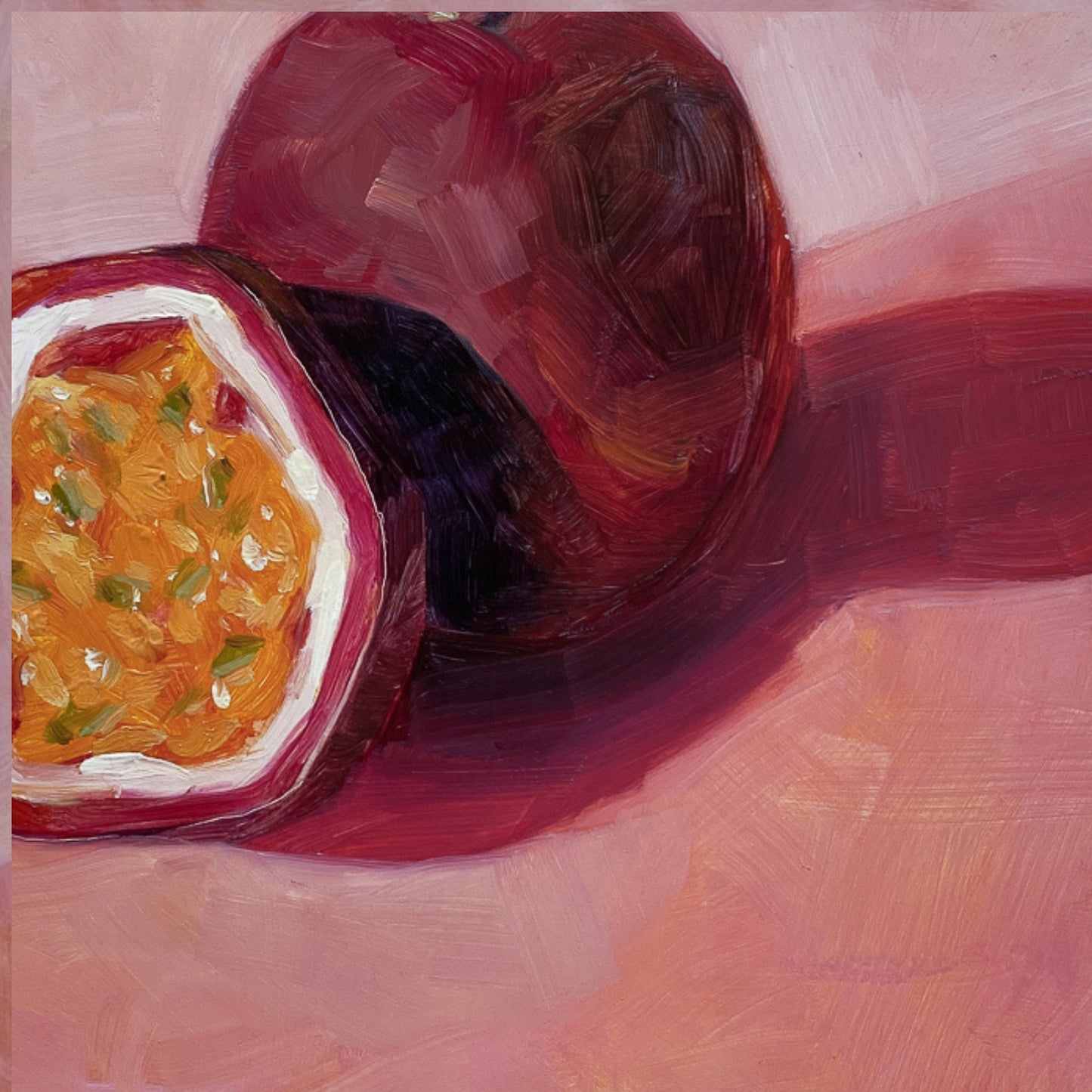closeup of an original painting of a burgundy, magenta whole passionfruit and half a passionfruit with seeds. They are sitting on a soft pink surface and there are strong shadows and a diagonal background