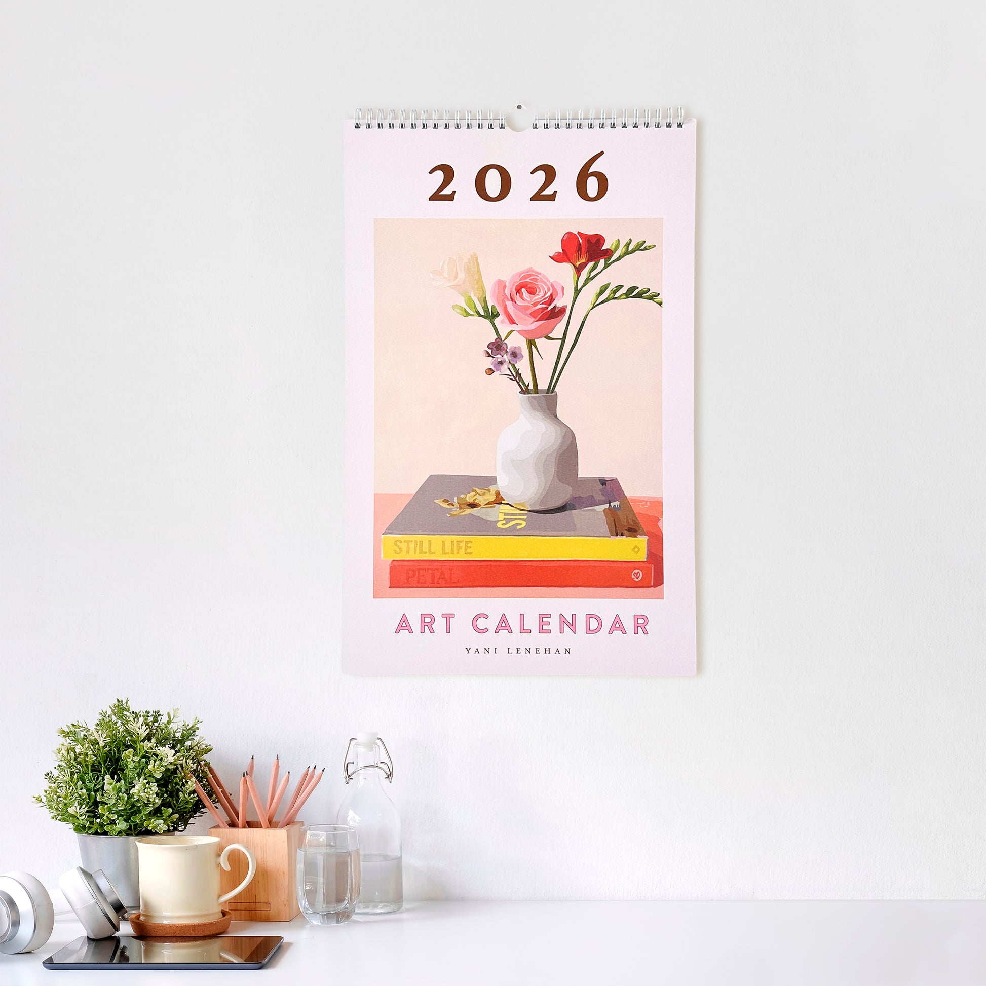 2026 art calendar with floral design on a white wall