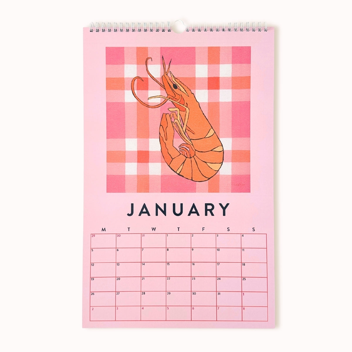 Calendar with a shrimp illustration on a pink plaid background