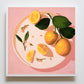 fine art print of a colorful and modern original oil painting of bright yellow lemons on a warm pink background with strong shadows