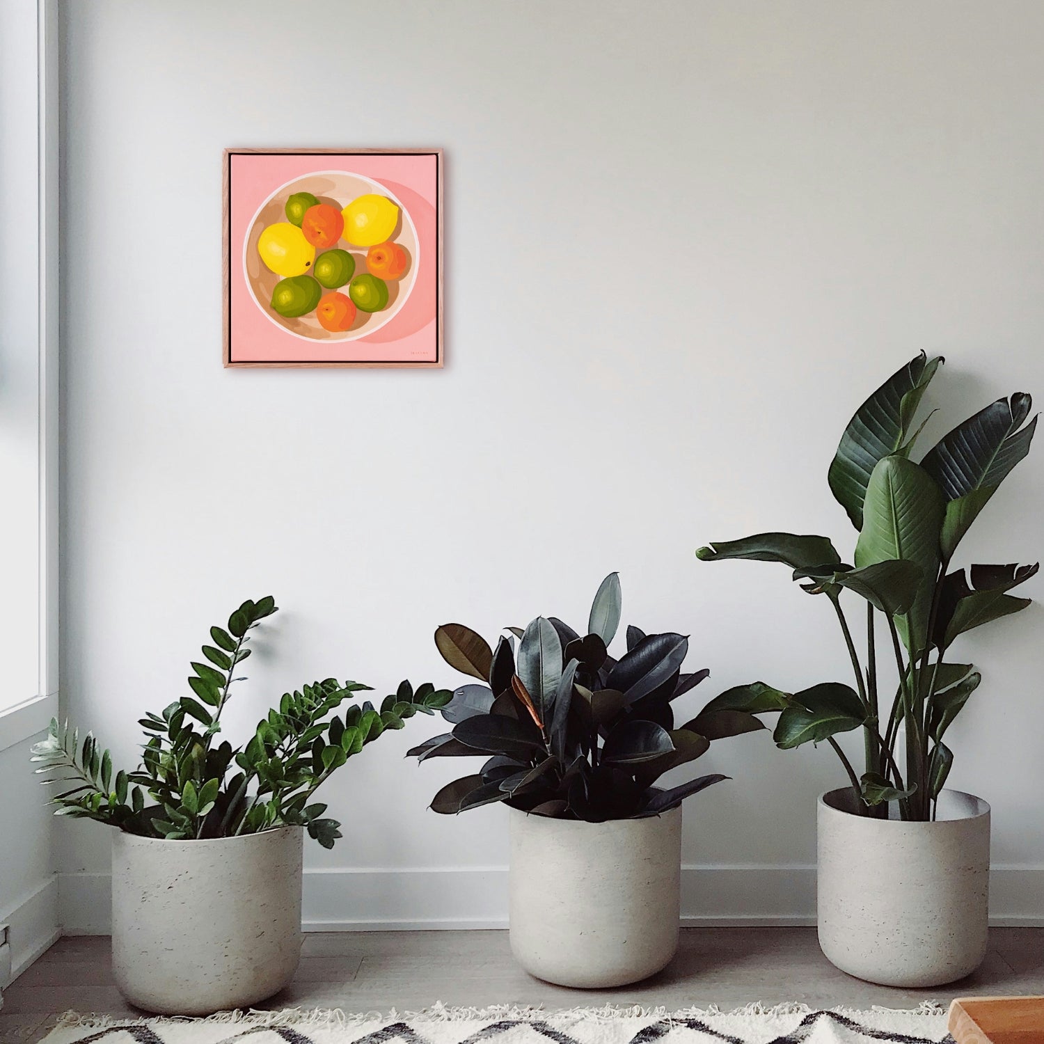 contemporary modern original oil painting of colourful lemons, mandarines and lime fruits in a bowl on a soft pink background
