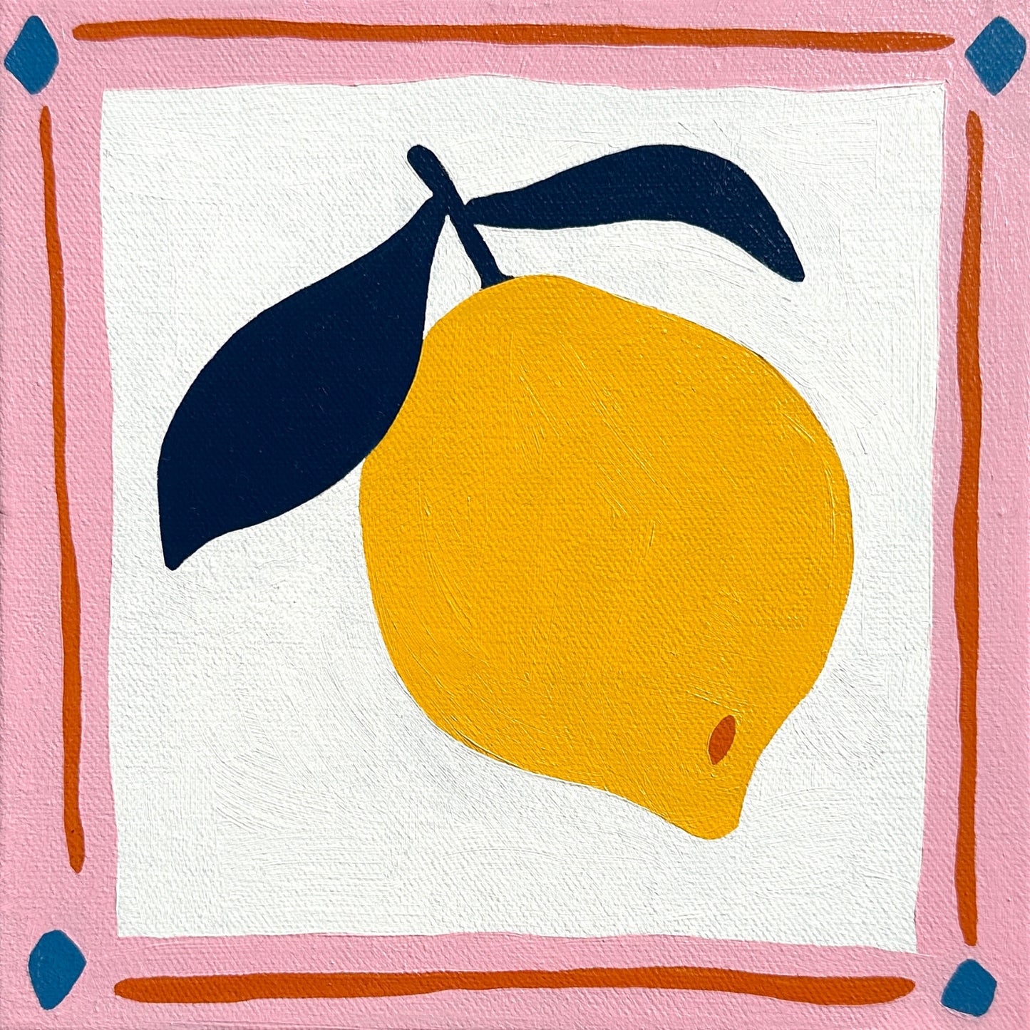 colorful modern and contemporary original oil artwork of a bright yellow lemon with navy blue leaves and a pink border by emerging australian artist yani lenehan