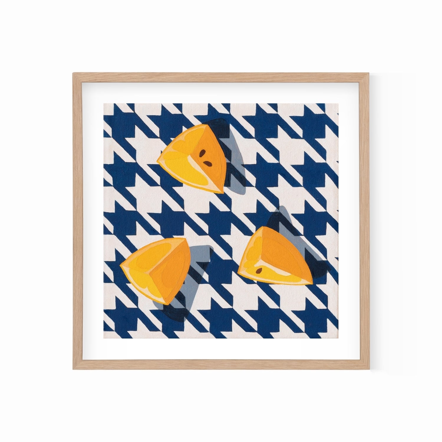 fine art print of a colorful and modern original oil painting of bright yellow lemons on a houndstooth navy blue and white background with strong shadows