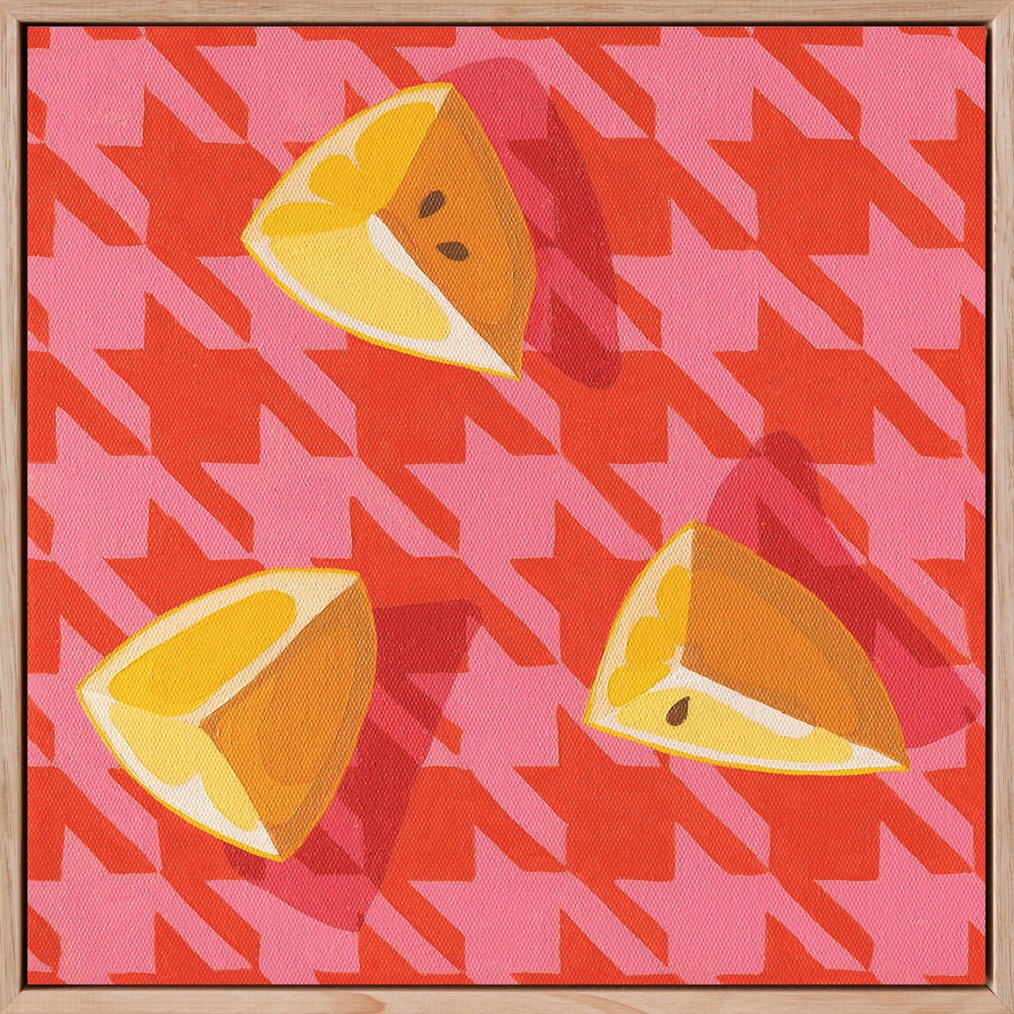 fine art framed canvas print of an original oil painting of three wedges of lemon on a pink and red houndstooth background