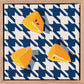 an original oil painting of three wedges of yellow lemons on a navy blue and white houndstooth background with blue-grey shadows framed in American Ash timber shadow box
