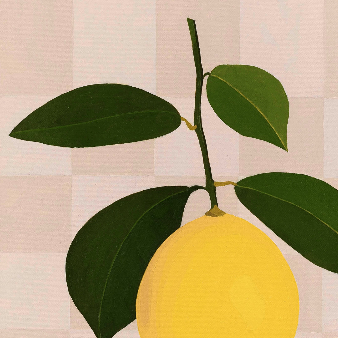 Yellow lemon with green leaves on a checkered background