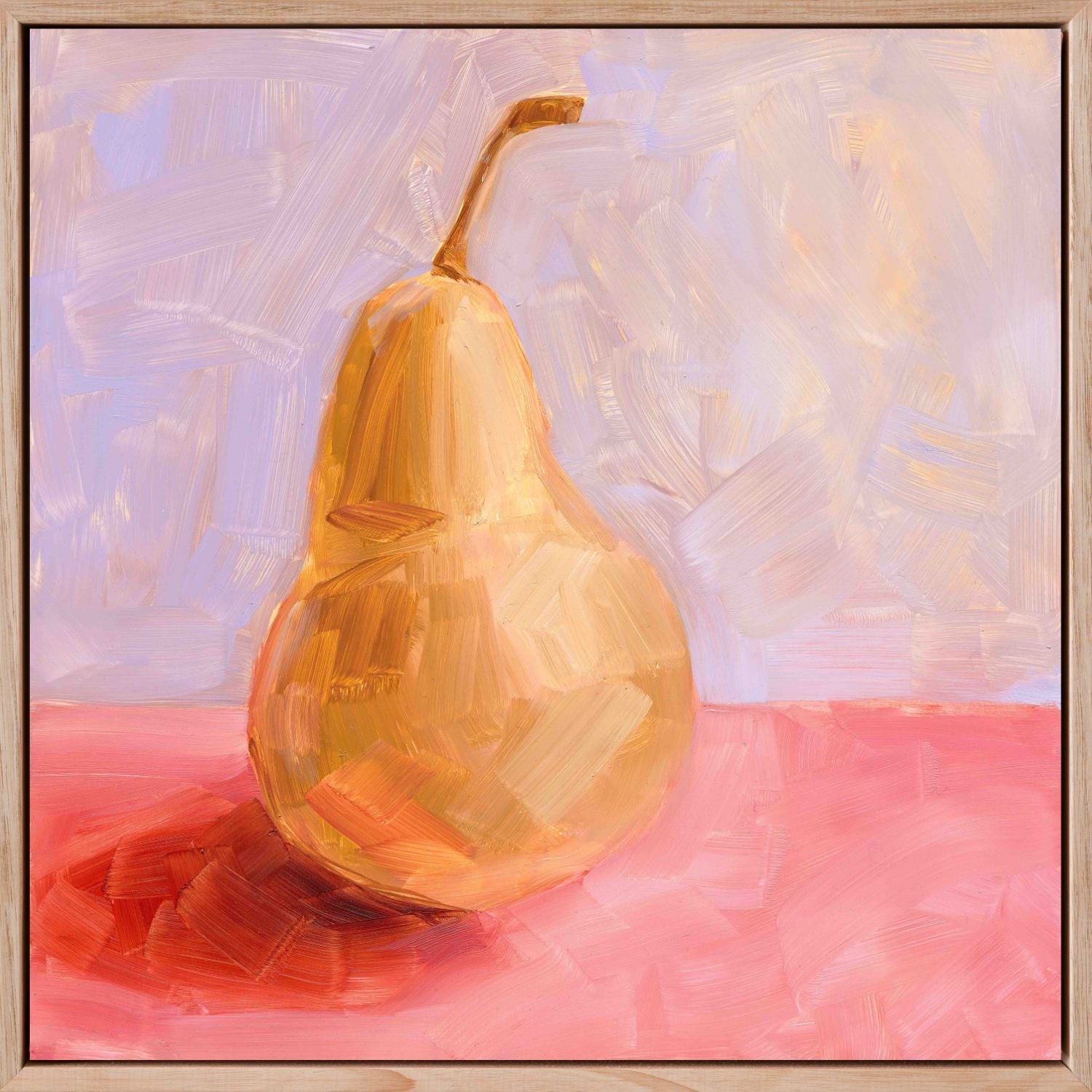 fine art framed canvas print of a yellow pear with strong red-pink shadows on a textured pink surface and a textured lilac background