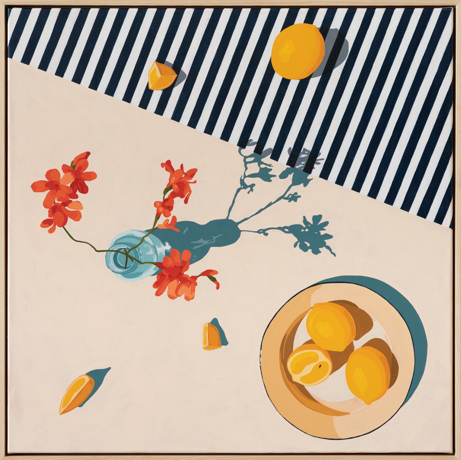 fine art print of yellow lemons spread out and on a plate on a cream and striped navy blue and white and a light blue vase with orange-red flowers