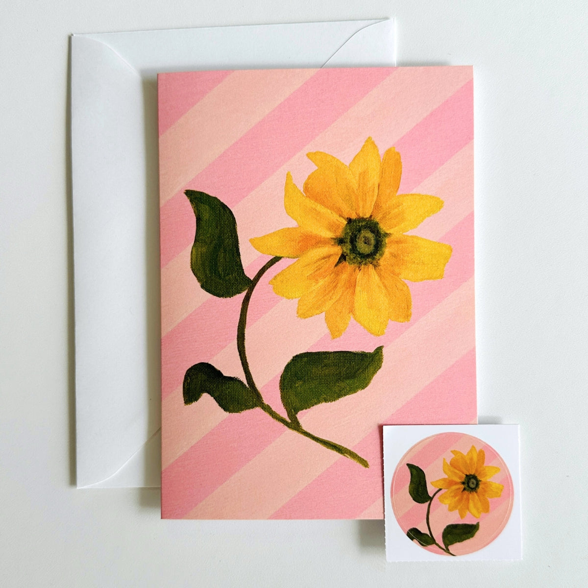 set of 4 greeting cards with pink and peachy stripes, pink scallops and a hand painted flowers. set comes with 4 matching stickers. blank inside
