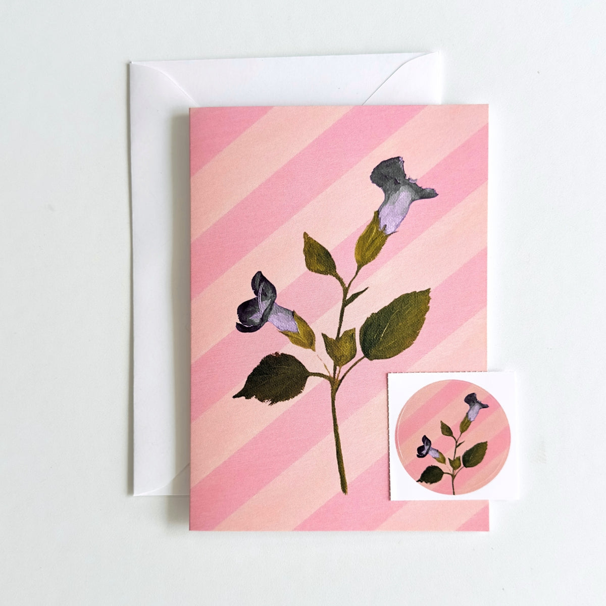 set of 4 greeting cards with pink and peachy stripes, pink scallops and a hand painted flowers. set comes with 4 matching stickers. blank inside