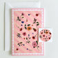 set of 4 greeting cards with pink and peachy stripes, pink scallops and a hand painted flowers. set comes with 4 matching stickers. blank inside