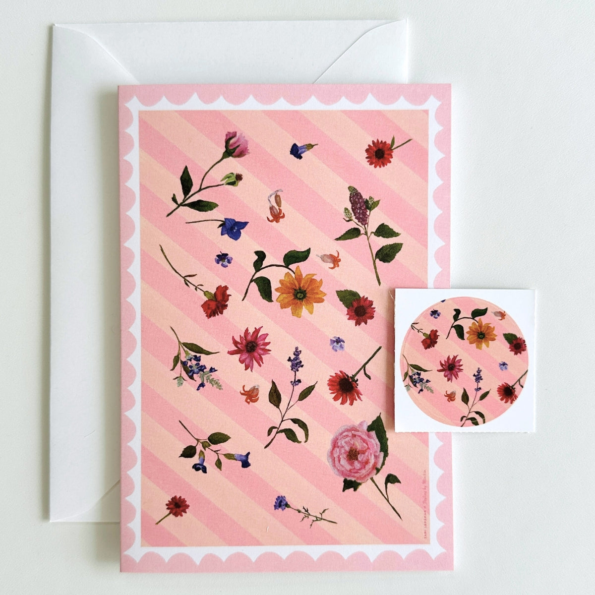 set of 4 greeting cards with pink and peachy stripes, pink scallops and a hand painted flowers. set comes with 4 matching stickers. blank inside