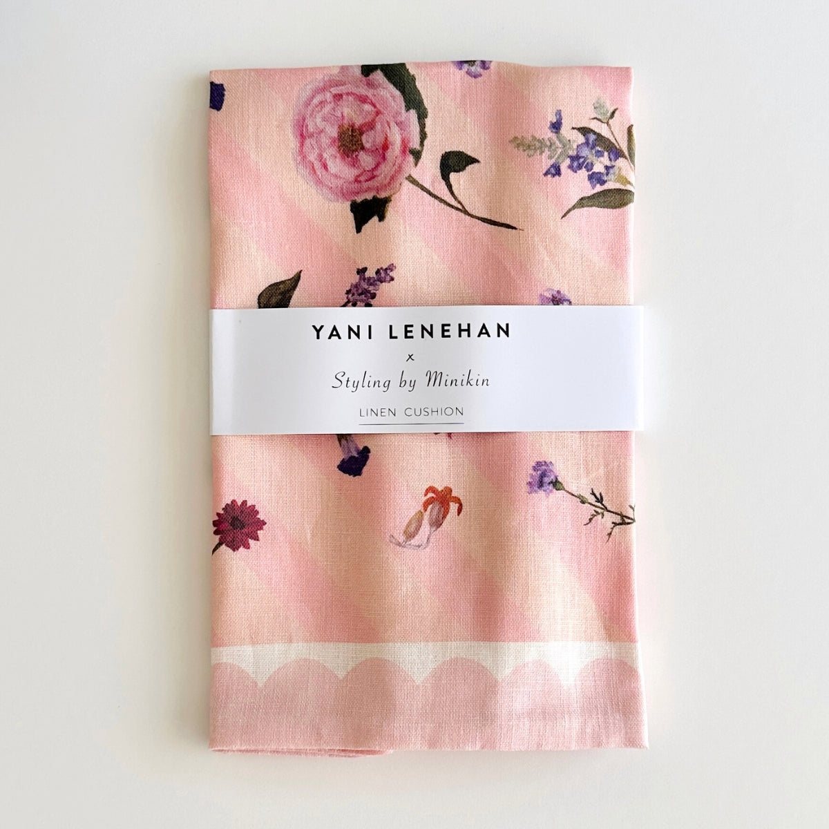 100% linen cushion with pink scallops, pink and peachy stripes and hand painted flowers