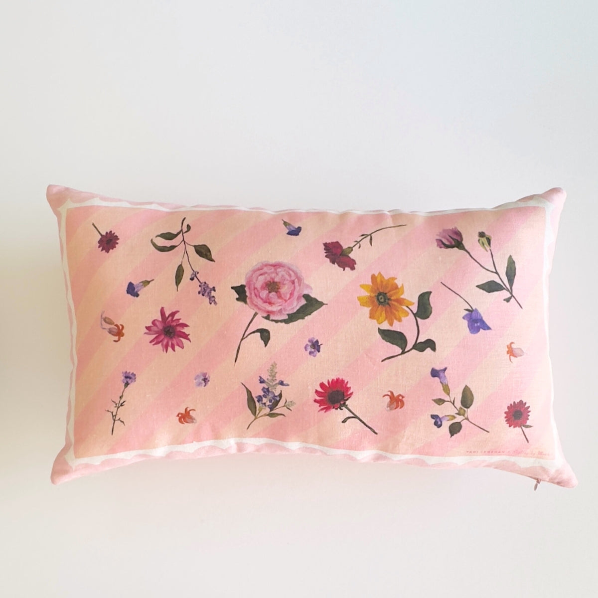 100% linen cushion with pink scallops, pink and peachy stripes and hand painted flowers