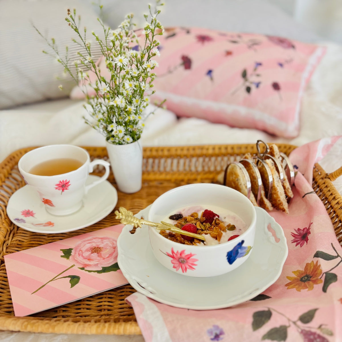 100% linen cushion with pink scallops, pink and peachy stripes and hand painted flowers
